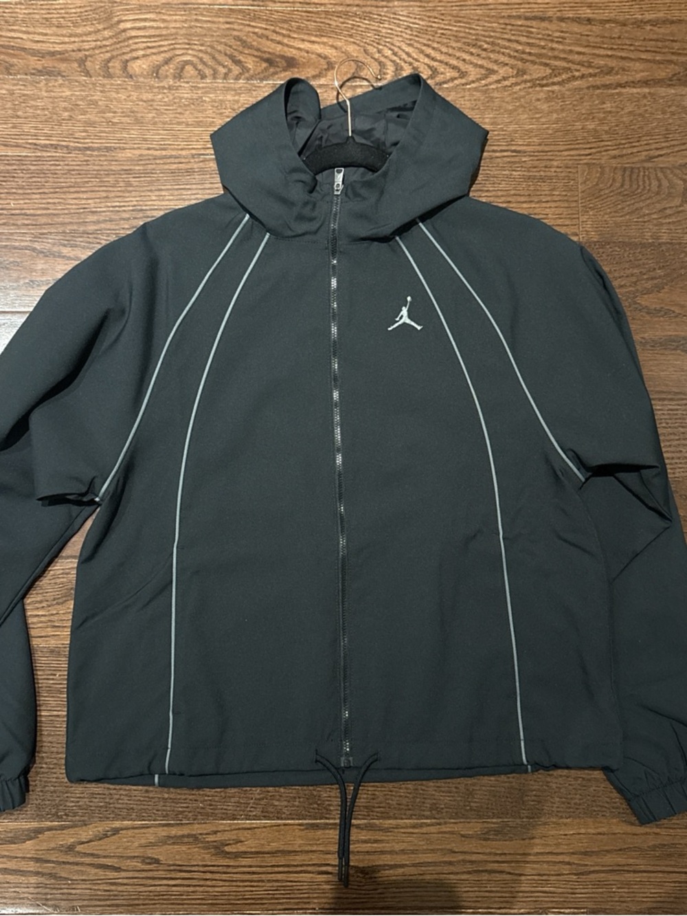 Air Jordan women’s Black Windbreaker Jacket with Reflective Piping